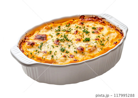 Sweet potato casserole with a crunchy pecan topping in white ceramic dish isolated on white transparent background. Concept of homemade comfort food Thanksgiving Day side dishes 117995288