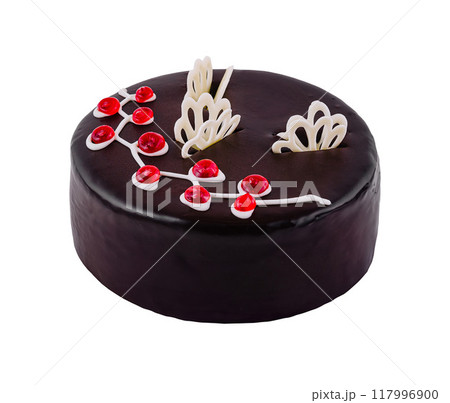 Chocolate cake decorated with chocolate leaves and red berries on white background Chocolate cake decorated with chocolate leaves and red berries on white background 117996900