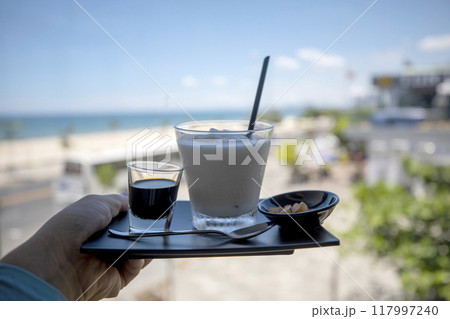 This is what a delicious banana coffee looks like. This is what a delicious banana coffee looks like. 117997240