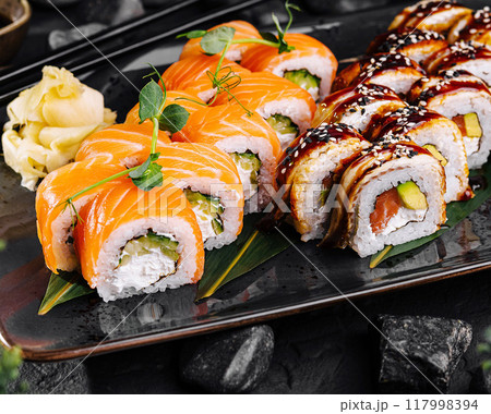 Delectable sushi platter with fresh ingredients Delectable sushi platter with fresh ingredients 117998394