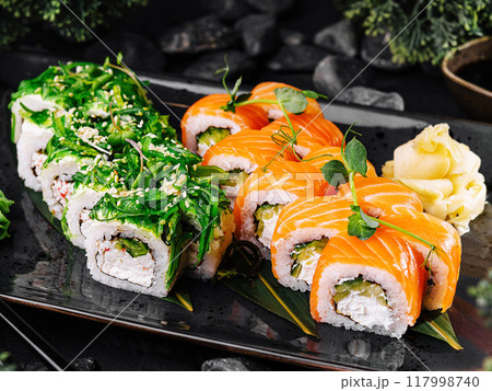 Fresh salmon sushi roll platter Fresh salmon sushi roll platter 117998740