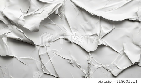 Crumpled white paper texture against a neutral backdrop Crumpled white paper texture against a neutral backdrop 118001311