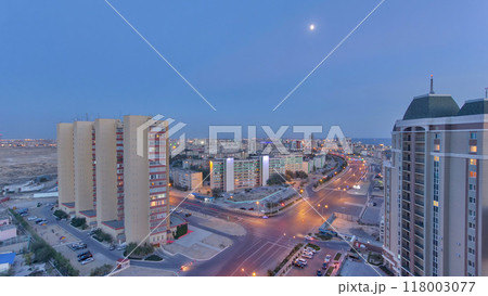 Aktau city after sunset on the shore of the Caspian Sea day to night timelapse. Kazakhstan. 118003077