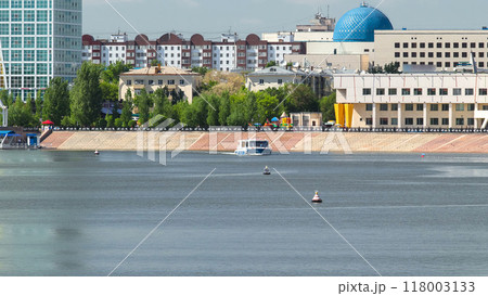 Astana, Kazakhstan. Pleasure boat on the river Ishim timelapse hyperlapse in Astana. Astana, Kazakhstan. Pleasure boat on the river Ishim timelapse hyperlapse in Astana. 118003133
