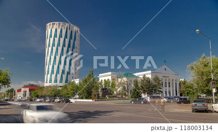 Exterior of the square next to the council of Astana city building with traffic on intersection in Astana, Kazakhstan. Exterior of the square next to the council of Astana city building with traffic on intersection in Astana, Kazakhstan. 118003134
