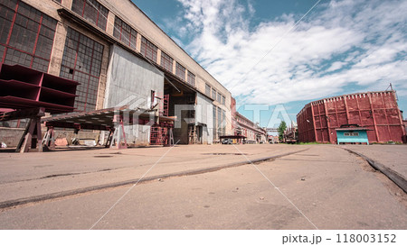 The old factory bricks building with windows and gates timelapse hyperlapse 118003152