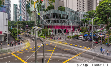 Aerial view of sidewalk and intersection of Orchard road in Singapore timelapse hyperlapse. 118003181