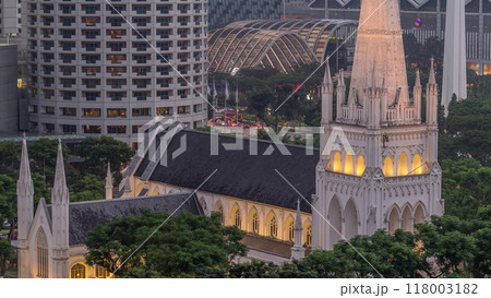 St. Andrew's Cathedral aerial day to night timelapse. It is an Anglican cathedral in Singapore, the country's largest cathedral. 118003182