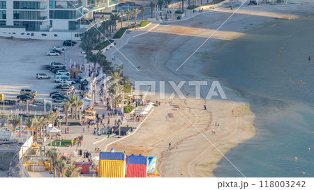 Beach on Al Reem island in Abu Dhabi during sunset timelapse from above. Beach on Al Reem island in Abu Dhabi during sunset timelapse from above. 118003242