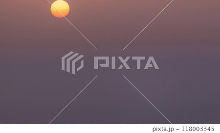 Sunrise close up view over Dubai skyline in the morning, aerial top view from downtown timelapse. 118003345