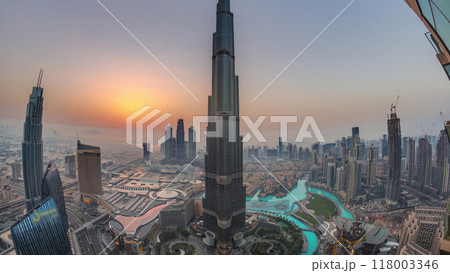 Panoramic skyline view of Dubai downtown during sunrise with mall, fountains and Burj Khalifa aerial morning timelapse 118003346