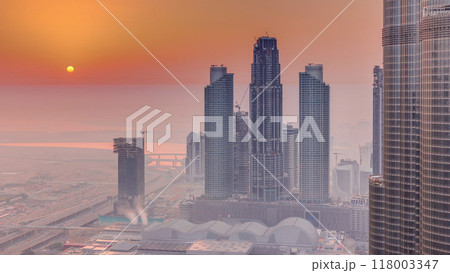 Amazing sunrise aerial view of Dubai downtown skyscrapers morning timelapse, Dubai, United Arab Emirates 118003347