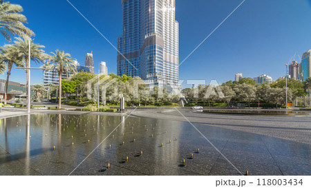 Fountains near main entrance to the tallest skyscraper timelapse hyperlapse, Dubai 118003434