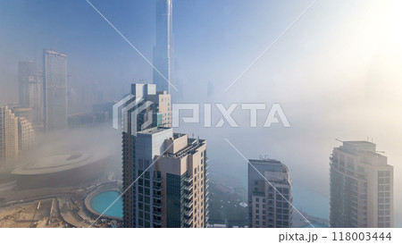 Foggy morning in downtown of Dubai all day timelapse. Foggy morning in downtown of Dubai all day timelapse. 118003444