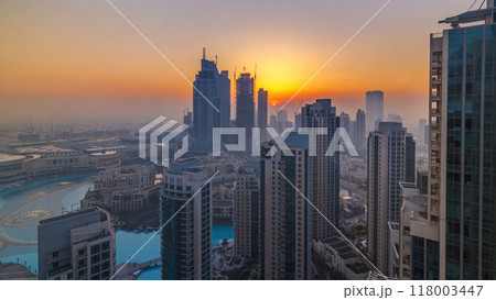 Foggy morning sunrise in downtown of Dubai timelapse. Foggy morning sunrise in downtown of Dubai timelapse. 118003447