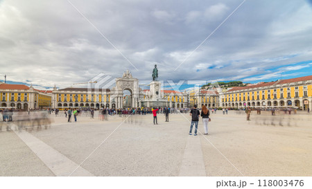 Triumphal arch at Rua Augusta and bronze statue of King Jose I at Commerce square timelapse hyperlapse in Lisbon, Portugal. 118003476