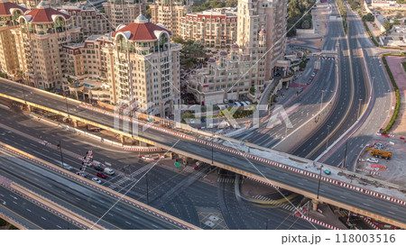Aerial view of highway interchange in Dubai downtown evening timelapse. Aerial view of highway interchange in Dubai downtown evening timelapse. 118003516