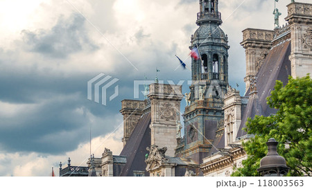 Architecture of The Hotel de Ville City Hall with french flag on tower timelapse, the building housing the local administration of the city of Paris 118003563