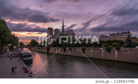 Cathedral Notre Dame de Paris day to night timelapse after sunset in Paris, France. Cathedral Notre Dame de Paris day to night timelapse after sunset in Paris, France. 118003706