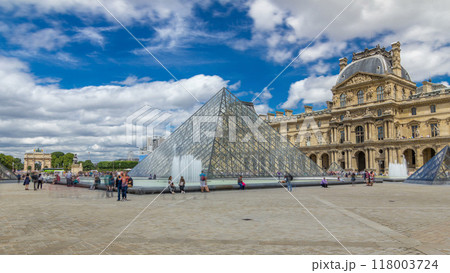 The large glass pyramid and the main courtyard of the Louvre Museum timelapse hyperlapse. Paris, France The large glass pyramid and the main courtyard of the Louvre Museum timelapse hyperlapse. Paris, France 118003724