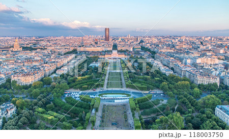 Aerial view of a large city skyline at sunset timelapse. Top view from the Eiffel tower. Paris, France. 118003750