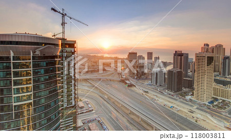 Sunset aerial top view timelapse at Dubai Marina and JLT in Dubai, UAE 118003811