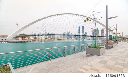 Pedestrian Bridge over the Dubai Water Canal day timelapse, United Arab Emirates Pedestrian Bridge over the Dubai Water Canal day timelapse, United Arab Emirates 118003858