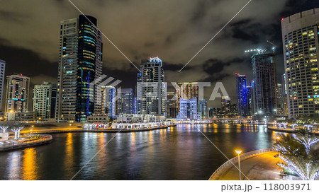 Dubai Marina towers and canal in Dubai night timelapse hyperlapse 118003971