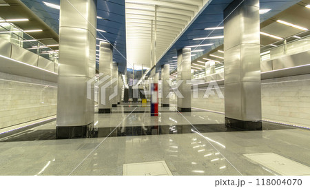 Interior of a modern subway station with trains timelapse Interior of a modern subway station with trains timelapse 118004070