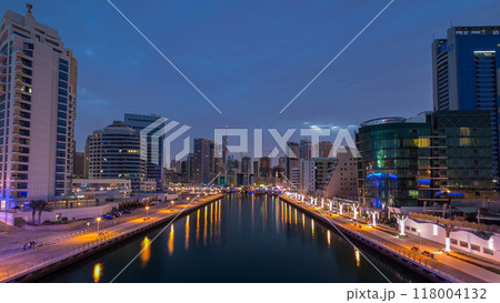 Dubai Marina towers and canal in Dubai night to day timelapse 118004132