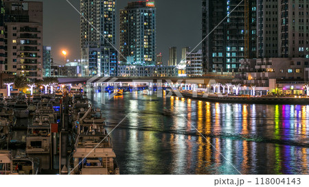 Promenade in Dubai Marina timelapse at night, UAE. Promenade in Dubai Marina timelapse at night, UAE. 118004143