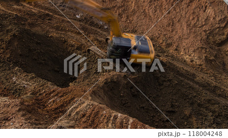 Yellow excavator on a construction site timelapse Yellow excavator on a construction site timelapse 118004248