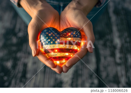 Hands holding a 3D heart with an American flag on it	 118006026