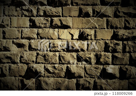 Old rough stone block wall. Black and white image. Old rough stone block wall. Black and white image. 118009266