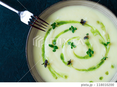 Mashed potatoes, with green butter, micro greenery, homemade, on a dark background, no people, top view, 118010200