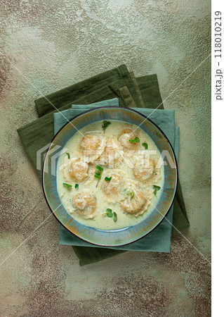 ravioli in cream sauce, spices and herbs, top view, no people, 118010219