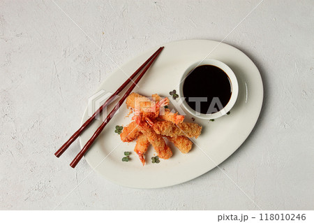 Fried shrimp, peeled in tempura, soy sauce, close-up, 118010246