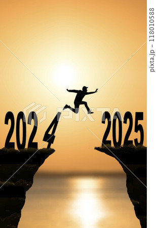2025 year concept. Silhouettes of active people in nature against the backdrop of sunset and the numbers 2025 118010588