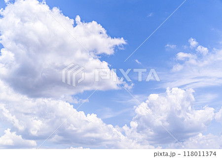 White clouds in a bright blue sky. The beauty of the nature White clouds in a bright blue sky. The beauty of the nature 118011374