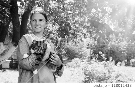 Young girl with cute cat 118011438