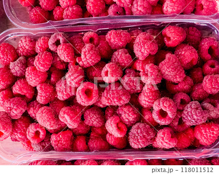 Fresh raspberries as a background. Organic Raspberries at the Farmer's Market 118011512