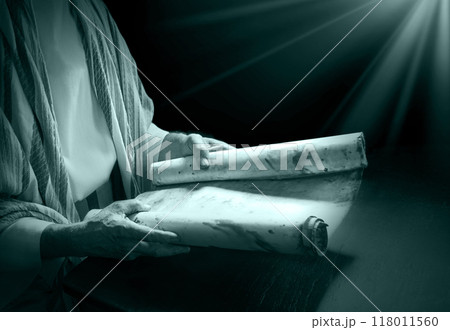 Man's hans holding a scroll 118011560