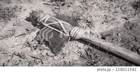 Stone ax of a primitive man Stone ax of a primitive man 118011592