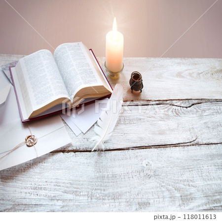 Bible on white wooden table Bible on white wooden table 118011613
