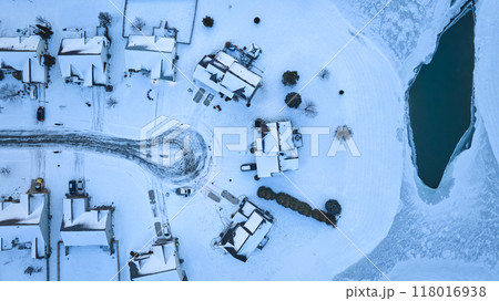 Aerial Winter Village by Frozen Lake at Blue Hour 118016938