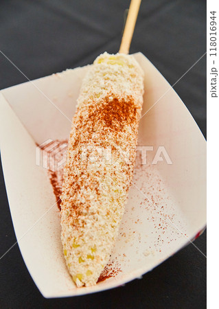 Authentic Elote Mexican Street Corn with Spices on Black Background 118016944