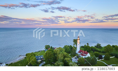Aerial Fly Over Wind Point Lighthouse at Sunset 118017003