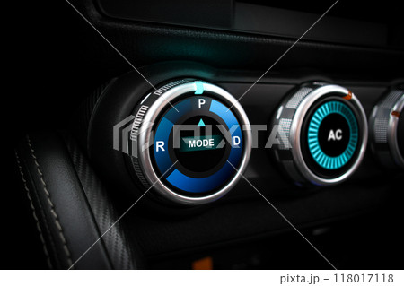 A rotary gear shift dial on the dashboard of an EV car or electric vehicle , P Parking A rotary gear shift dial on the dashboard of an EV car or electric vehicle , P Parking 118017118