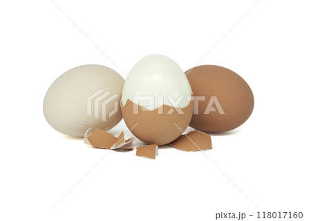 Egg in the process of being peeled, isolated on white Egg in the process of being peeled, isolated on white 118017160