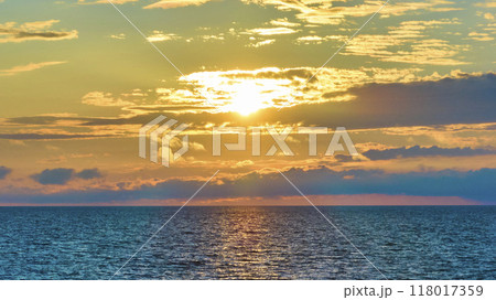 Aerial Sunset Over Tranquil Lake Michigan during Golden Hour 118017359